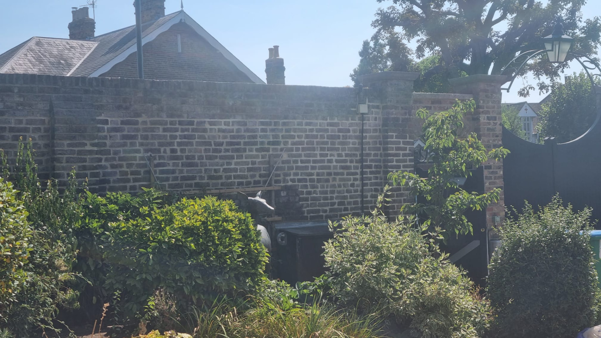 The same section of Hampton wall repointed in lime mortar